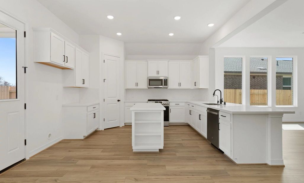 Kitchen. Sample product photo. Actual exterior and interior selections may vary by homesite. Photo
