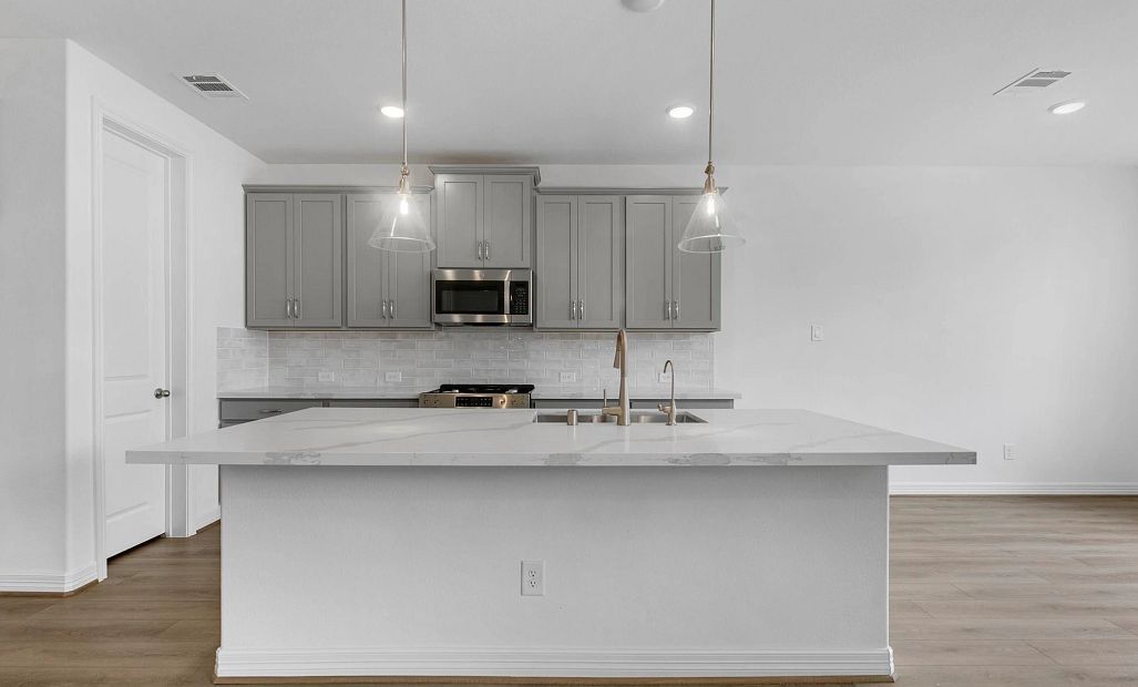 Kitchen. Sample product photo. Actual exterior and interior selections may vary by homesite. Photo