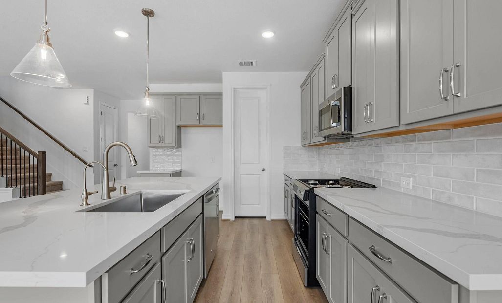 Kitchen. Sample product photo. Actual exterior and interior selections may vary by homesite. Photo