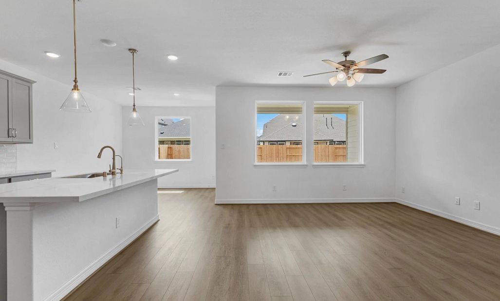 Gathering room. Sample product photo. Actual exterior and interior selections may vary by homesite.