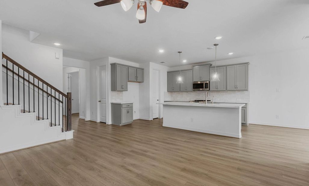 Gathering room. Sample product photo. Actual exterior and interior selections may vary by homesite.