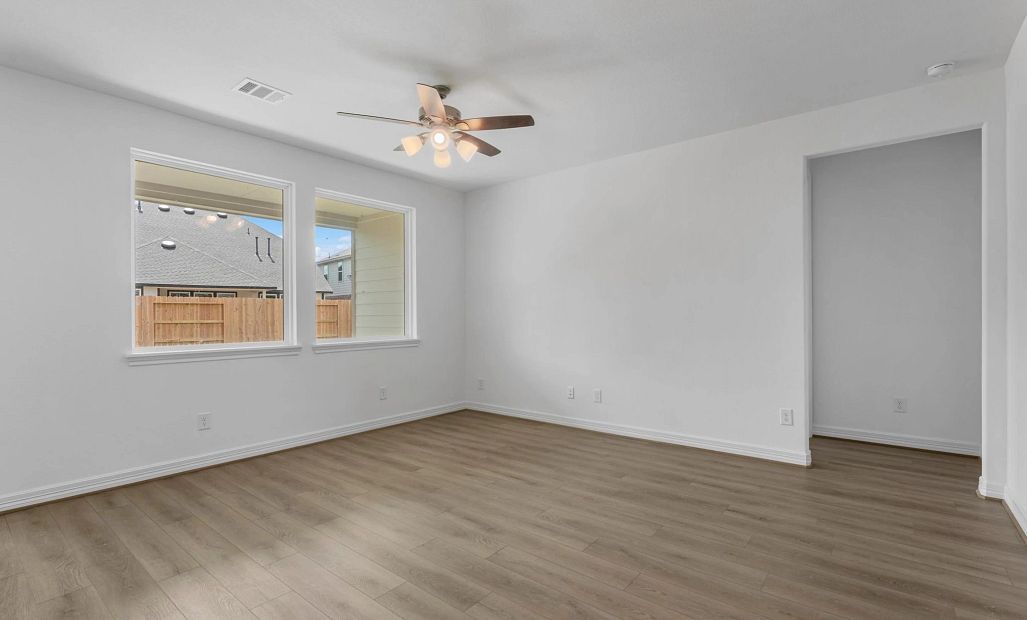 Gathering room. Sample product photo. Actual exterior and interior selections may vary by homesite.