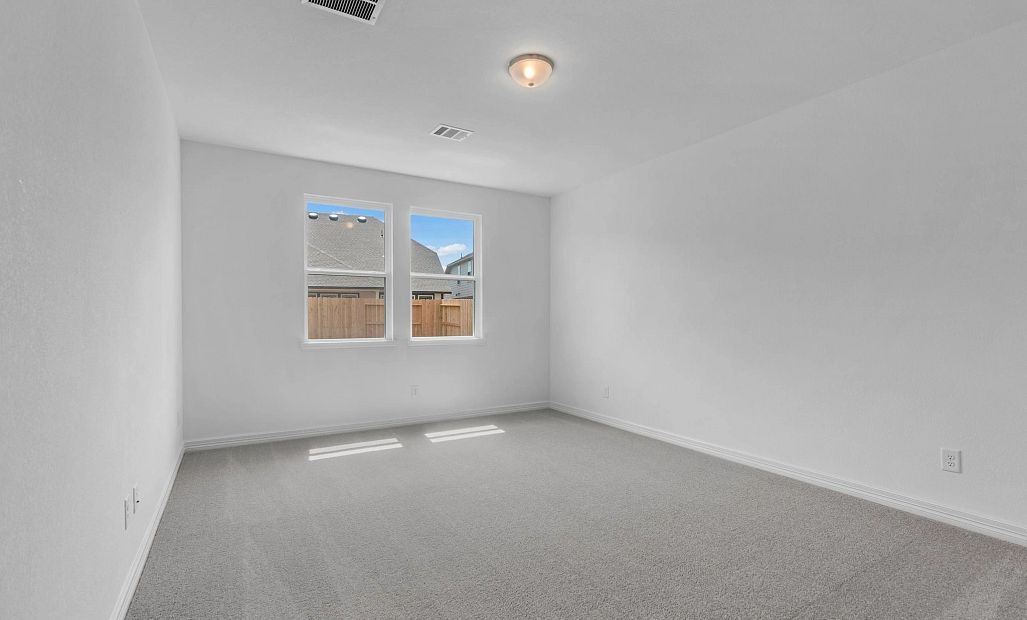 Primary bedroom. Sample product photo. Actual exterior and interior selections may vary by homesite.