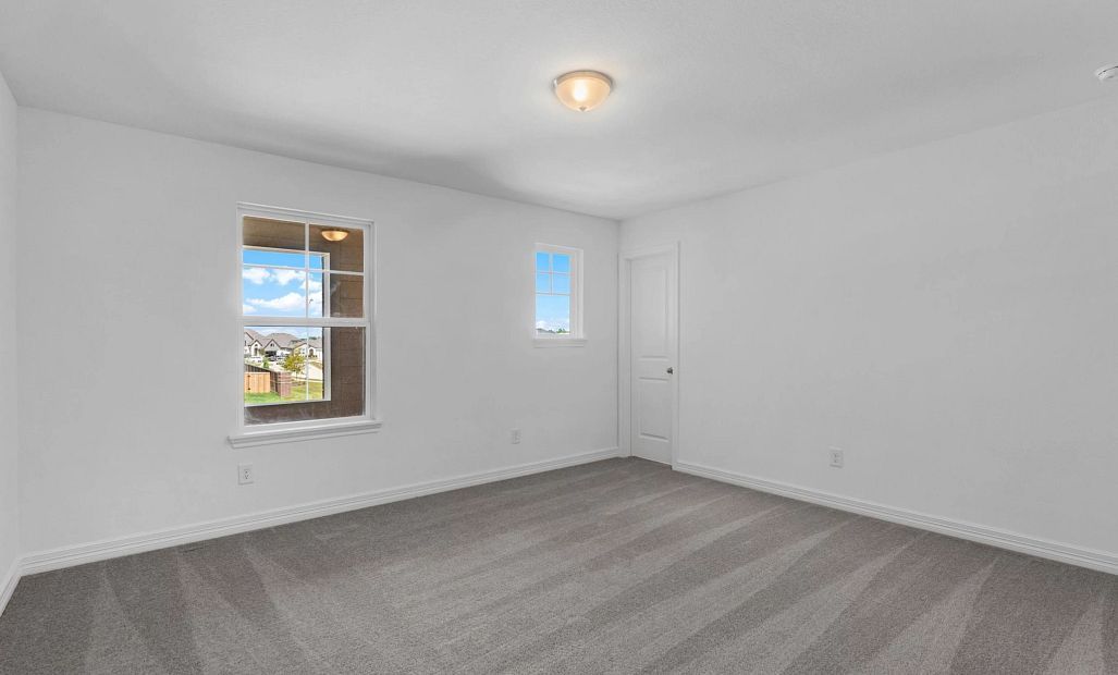 Secondary bedroom. Sample product photo. Actual exterior and interior selections may vary by