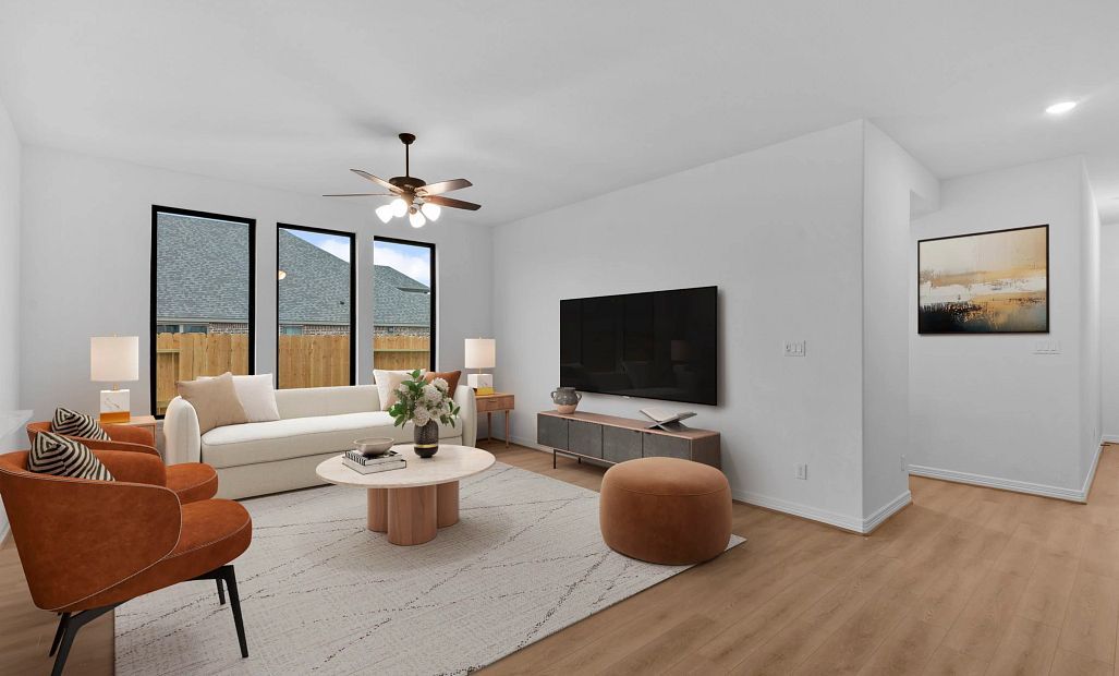 Gathering room. Sample product photo. Actual exterior and interior selections may vary by homesite.