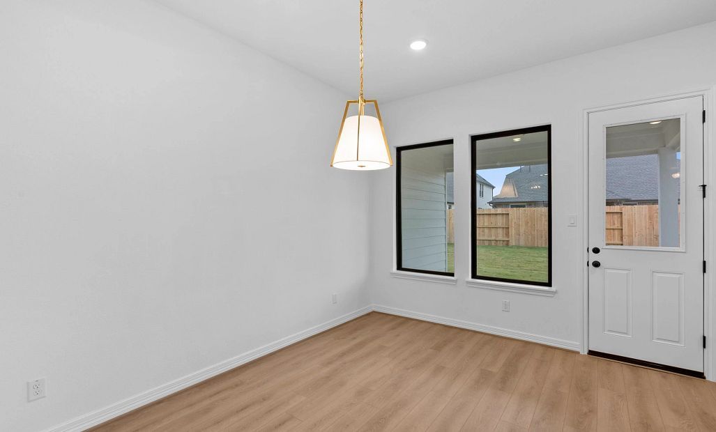 Dining space. Sample product photo. Actual exterior and interior selections may vary by homesite.