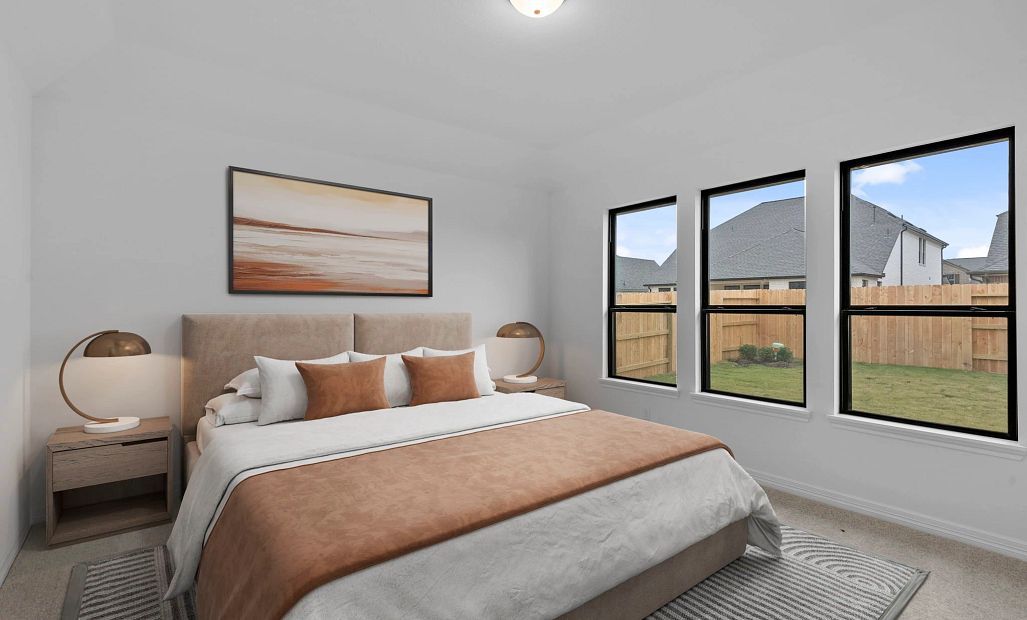 Primary bedroom. Sample product photo. Actual exterior and interior selections may vary by homesite.