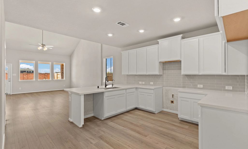 Kitchen. Sample product photo. Actual exterior and interior selections may vary by homesite. Photo