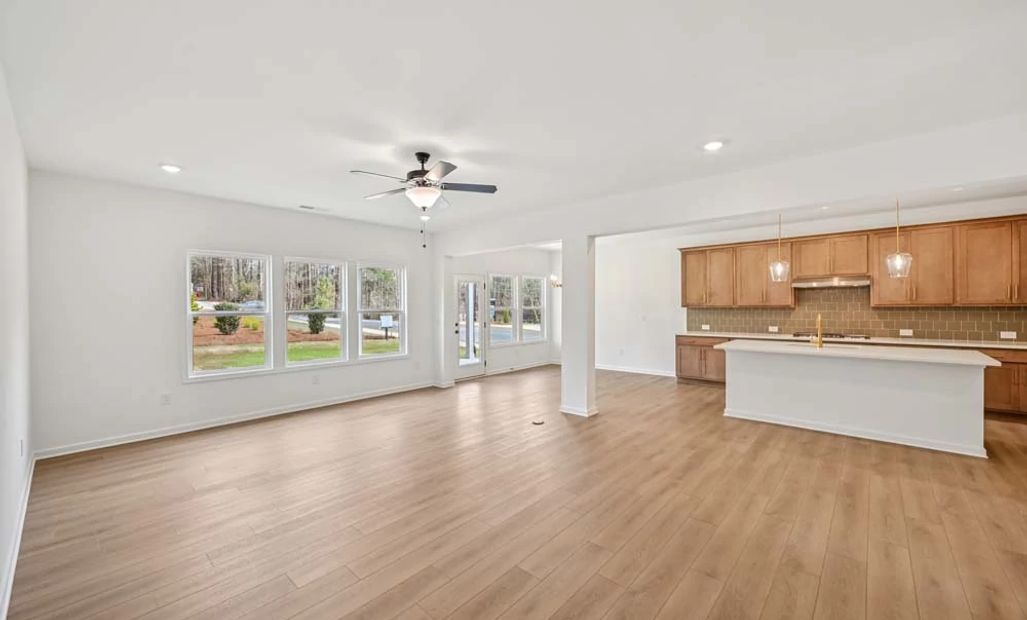 Representative Photo: Family Room & Kitchen View