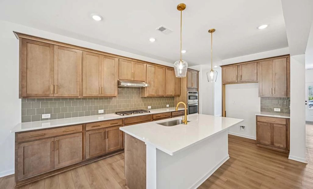 Representative Photo: Kitchen featuring Laguna Collection Finishes