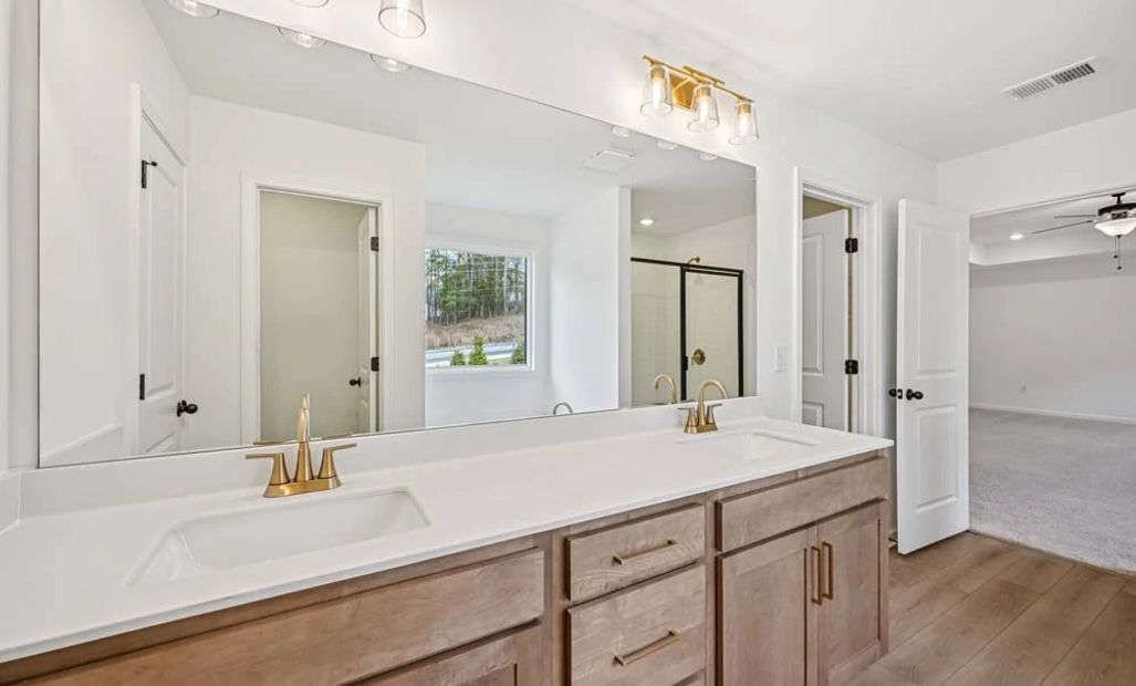 Representative Photo: Primary Bathroom featuring Laguna Collection Finishes