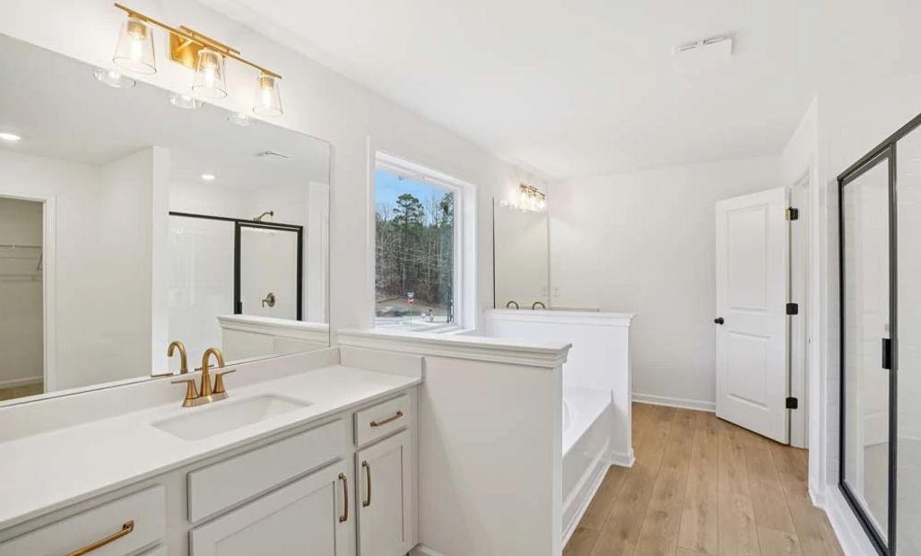 Representative Photo: Primary Bathroom featuring Serene Collection Finishes