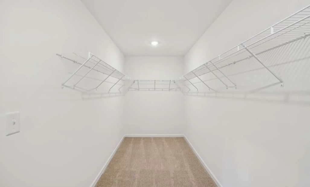 Representative Photo: Primary Bedroom Walk-In Closet