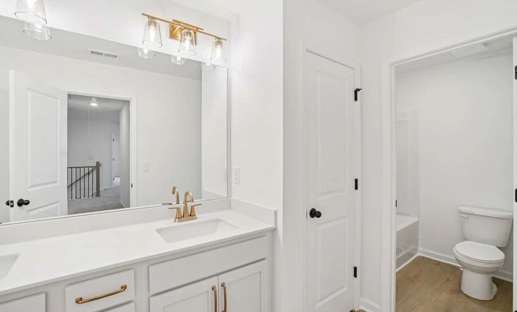 Representative Photo: Bathroom Two featuring Serene Collection Finishes