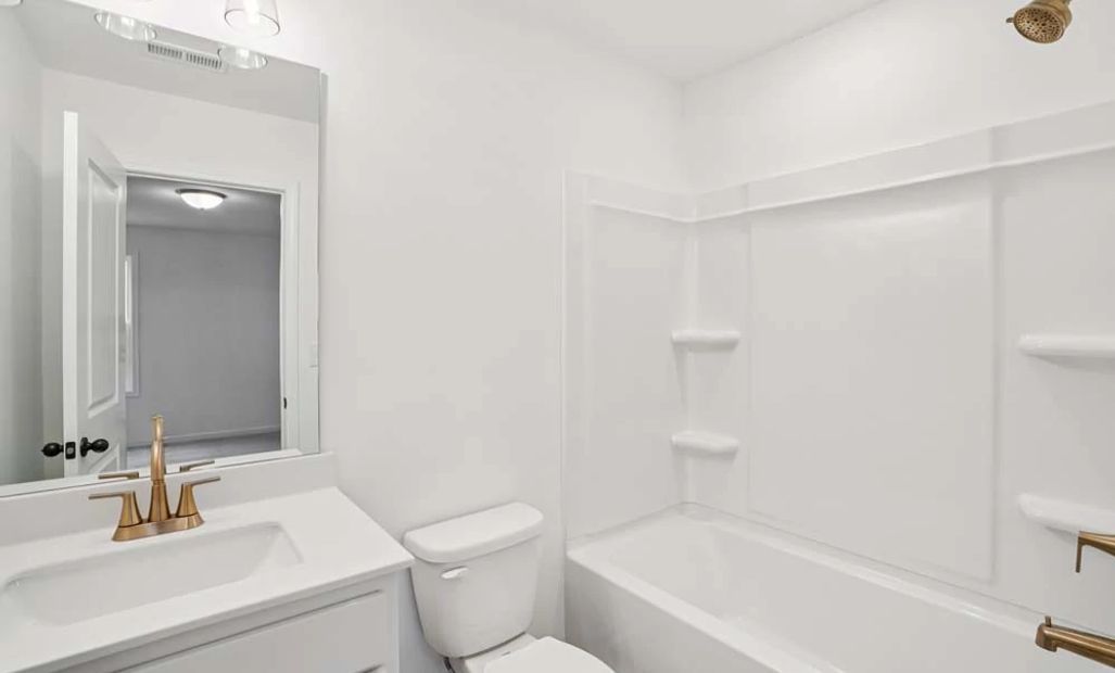 Representative Photo: Bathroom Three featuring Serene Collection Finishes