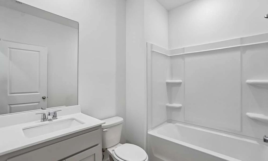 Guest Bathroom featuring Milan Collection Finishes