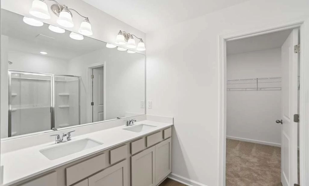 Representative Photo: Primary Bathroom featuring Artisan Collection Finishes