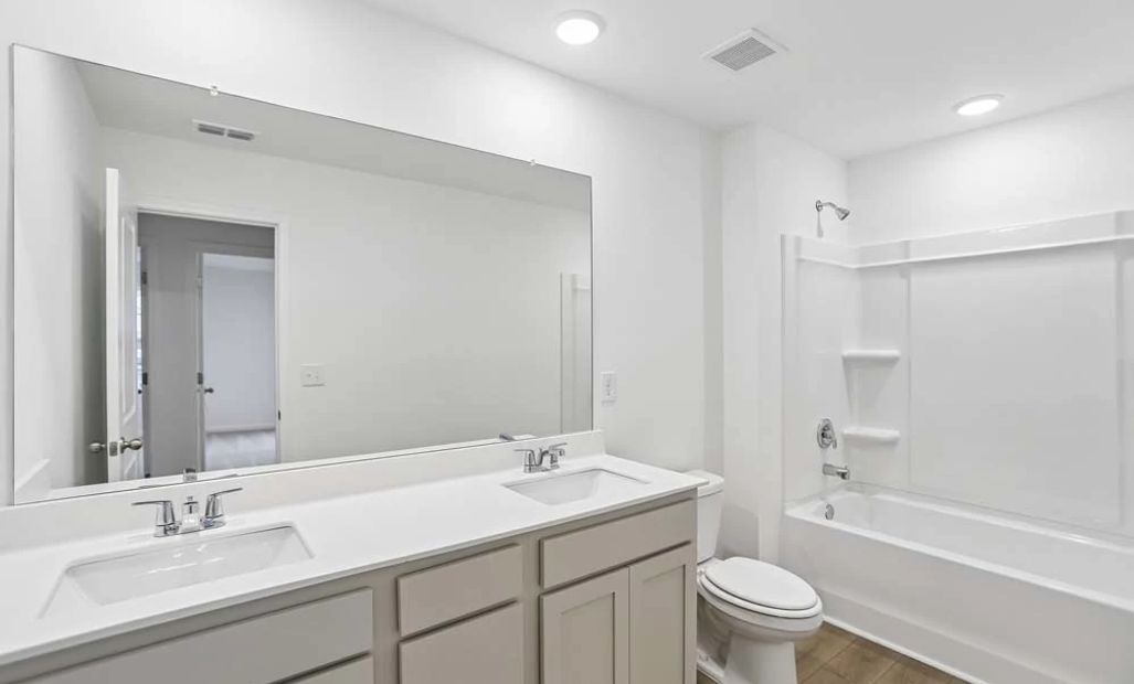 Representative Photo: Bathroom Two featuring Artisan Collection Finishes