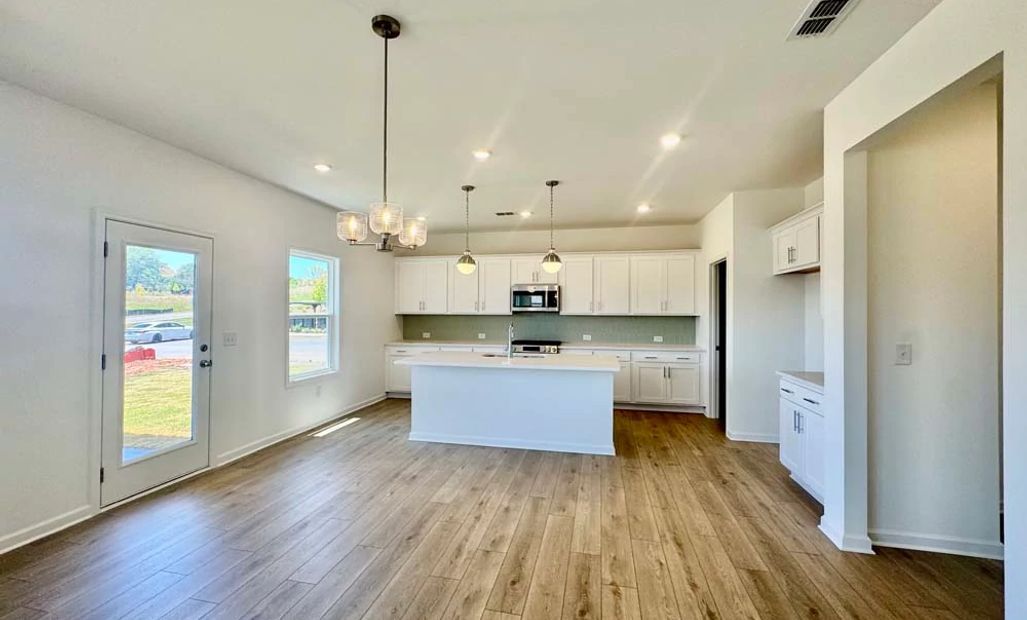 Sample Photo: Dining Area & Kitchen