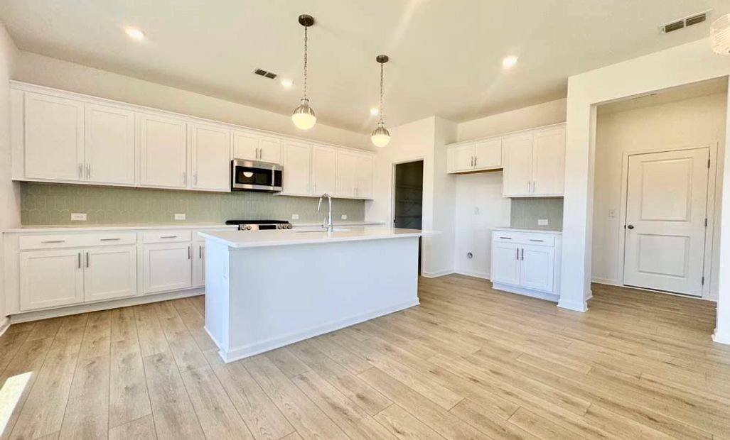 Sample Photo: Kitchen featuring Coastal Collection Finishes