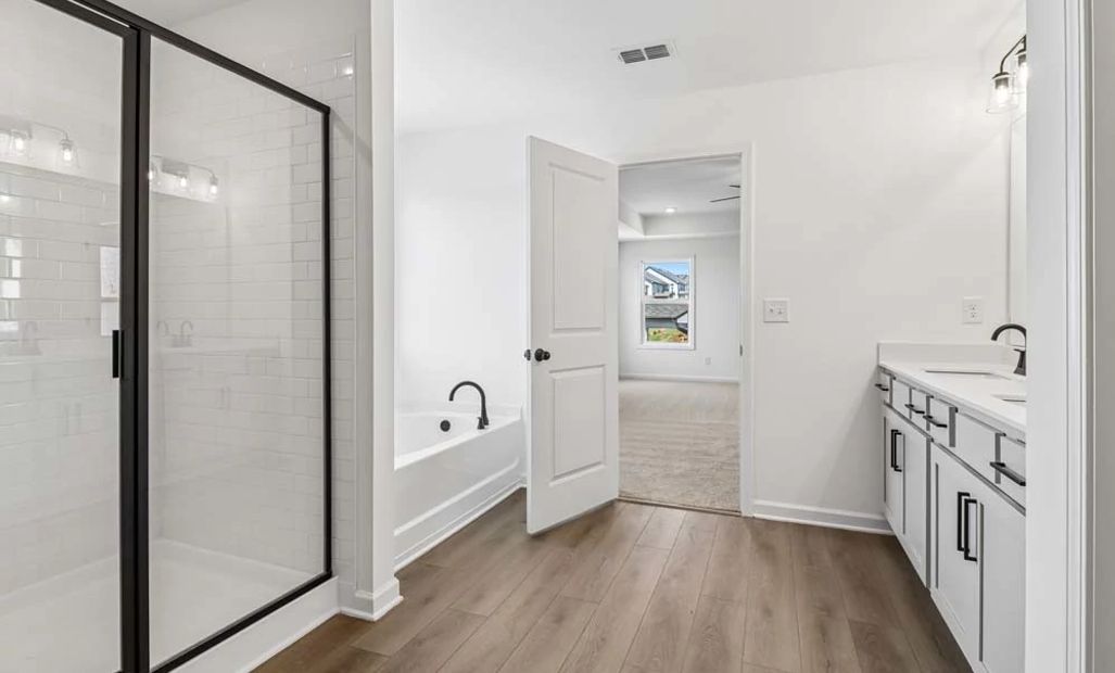 Sample Photo: Primary Bathroom Featuring Artisan Collection Finishes
