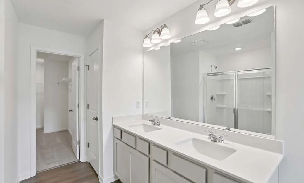 Sample Photo: Primary Bathroom Featuring Artisan Collection Finishes