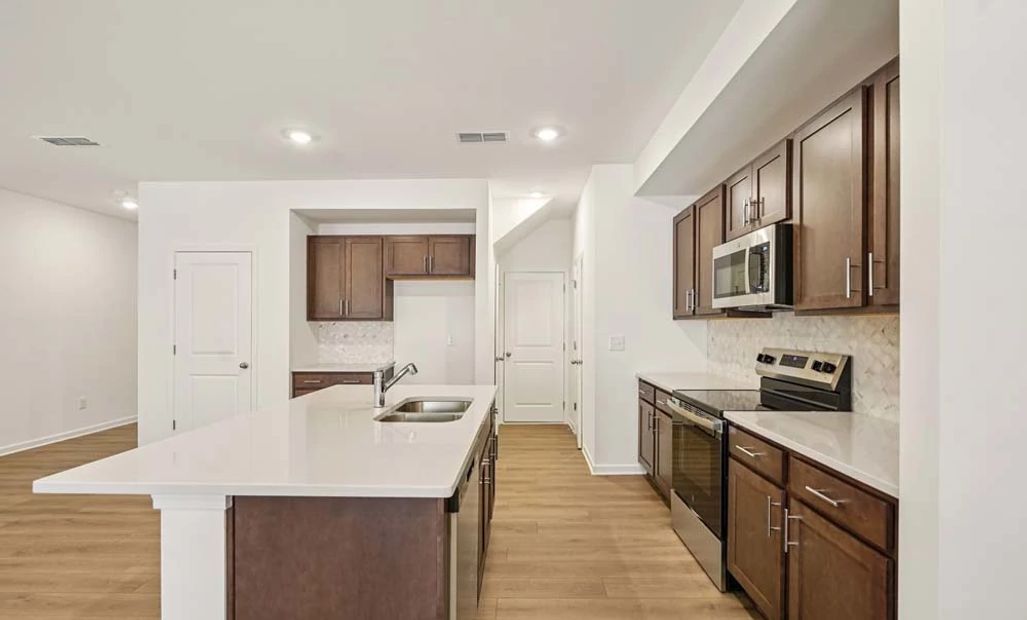 Sample Photo: Kitchen featuring Roosevelt Collection Finishes