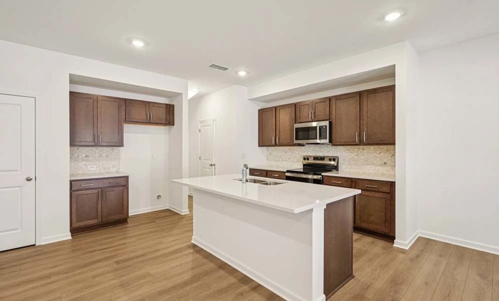 Sample Photo: Kitchen featuring Roosevelt Collection Finishes