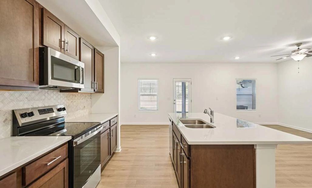 Sample Photo: Kitchen featuring Roosevelt Collection Finishes