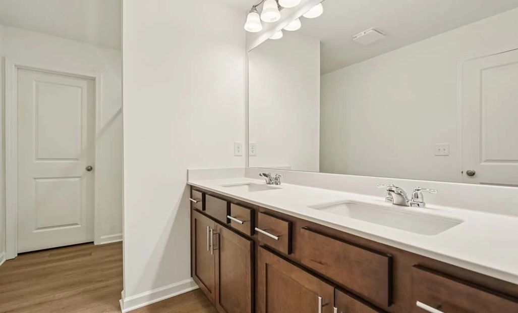 Sample Photo: Primary Bathroom featuring Roosevelt Collection Finishes