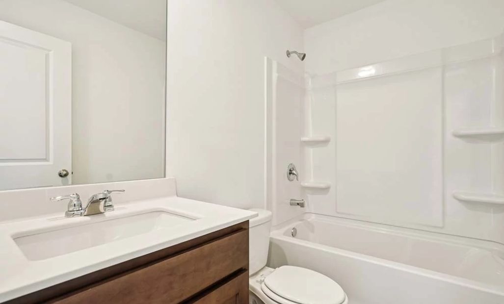 Sample Photo: Bathroom Two featuring Roosevelt Collection Finishes