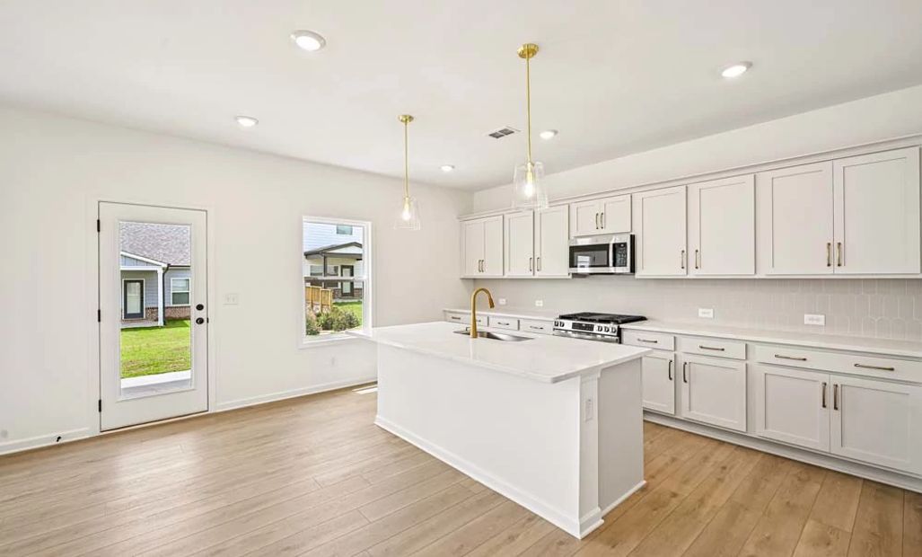 Sample Photo: Kitchen & Dining Area