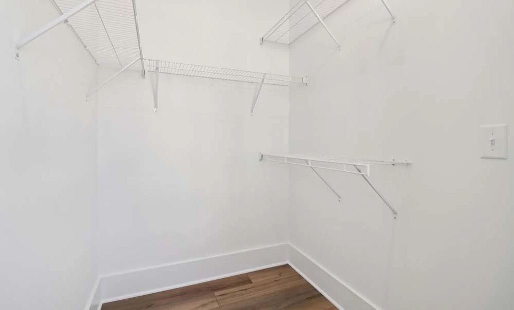 Representative Photo: Primary Bedroom Walk-In Closet