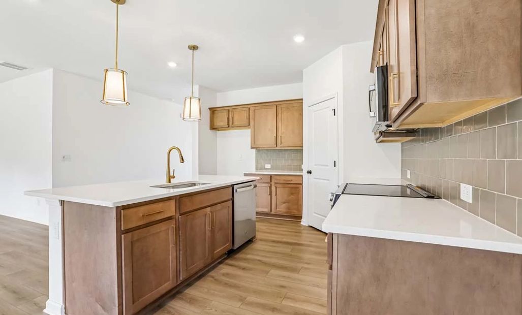 Sample Photo: Kitchen featuring Laguna Collection Finishes