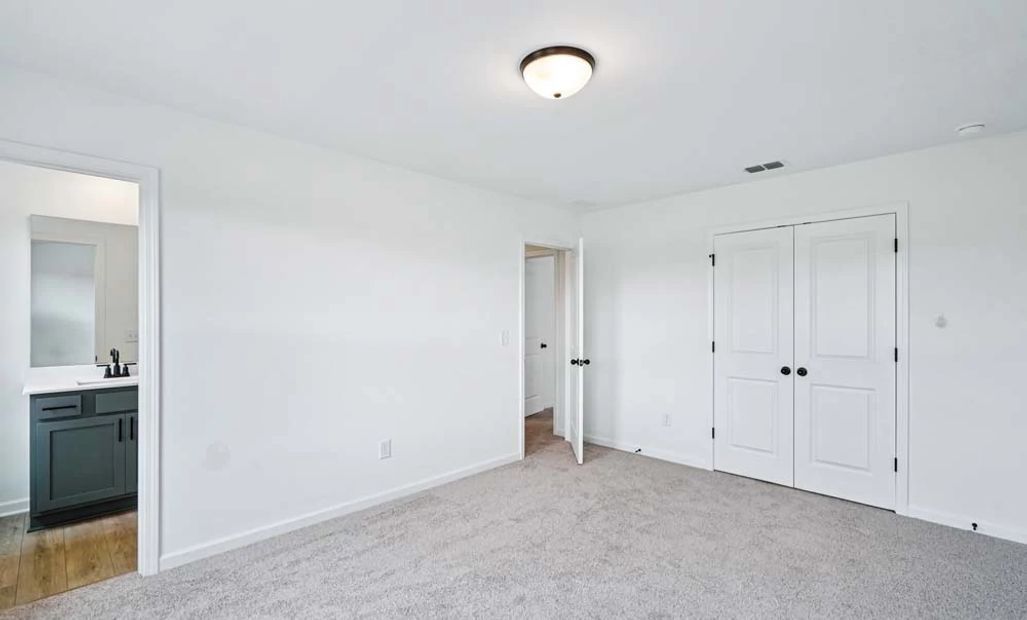 Representative Photo: Bedroom Three
