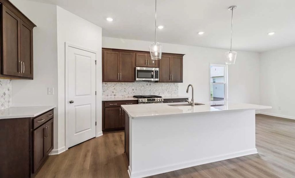 Sample Photo: Kitchen featuring Roosevelt Collection Finishes