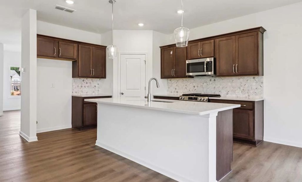 Sample Photo: Kitchen featuring Roosevelt Collection Finishes