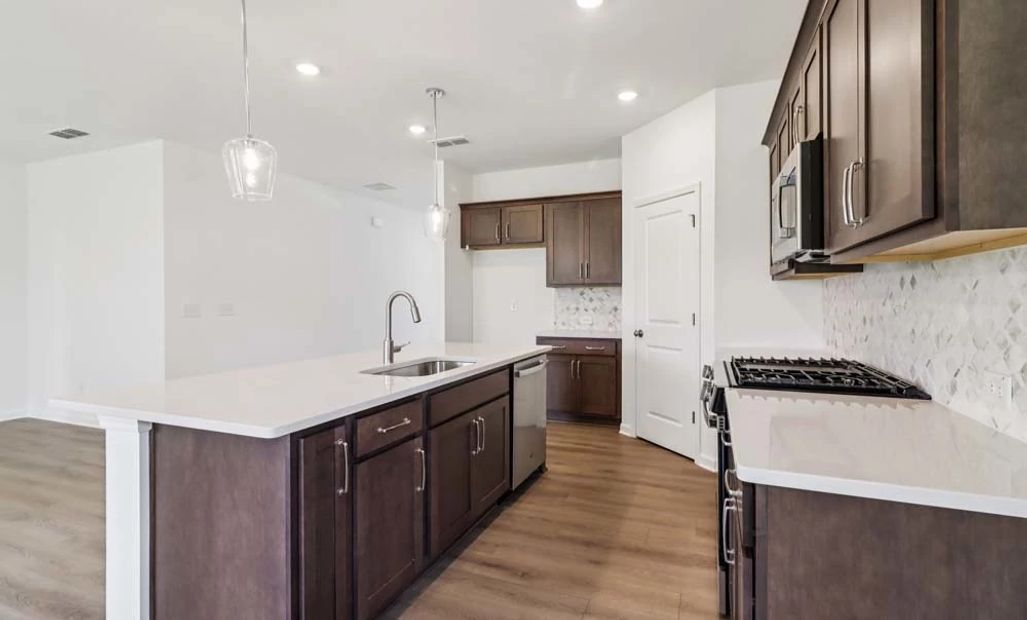 Sample Photo: Kitchen featuring Roosevelt Collection Finishes