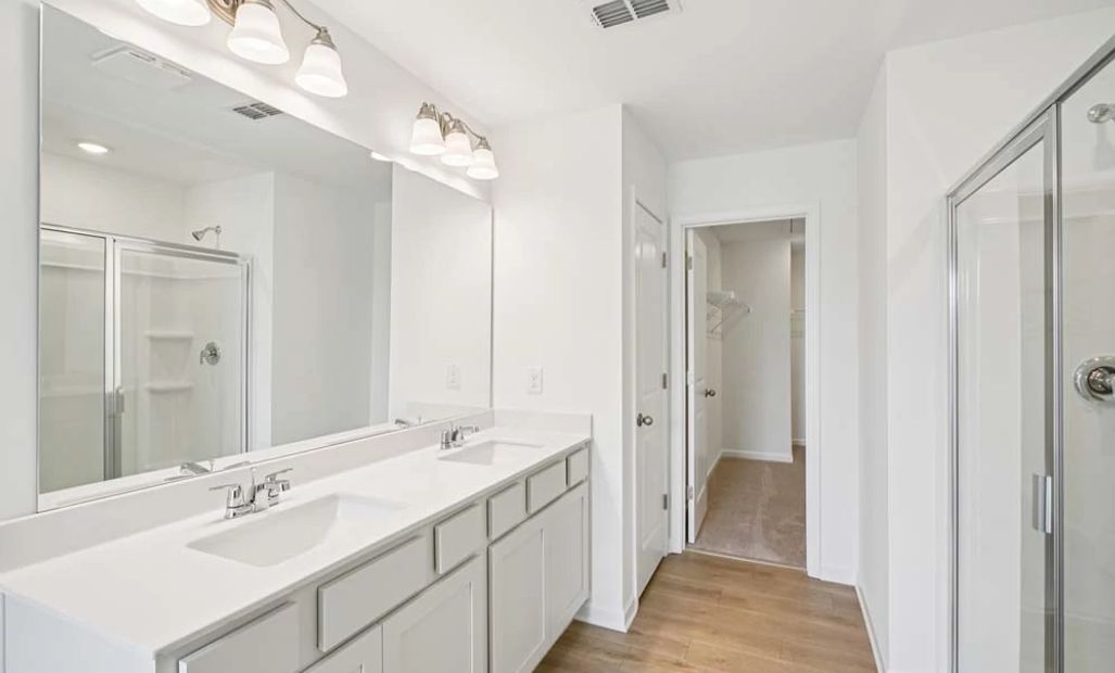 Sample Photo: Primary Bathroom featuring Serene Collection Finishes