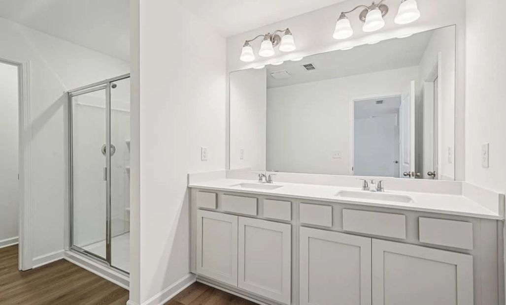 Sample Photo: Primary Bathroom Featuring Artisan Collection Finishes