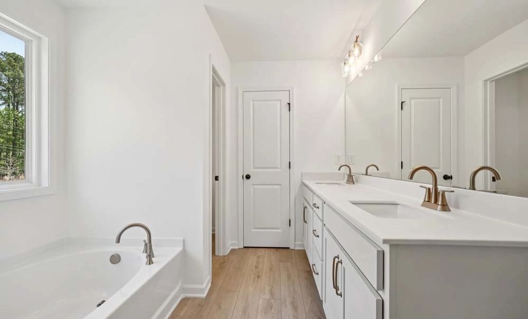 Sample Photo: Primary Bathroom Featuring Serene Collection Finishes