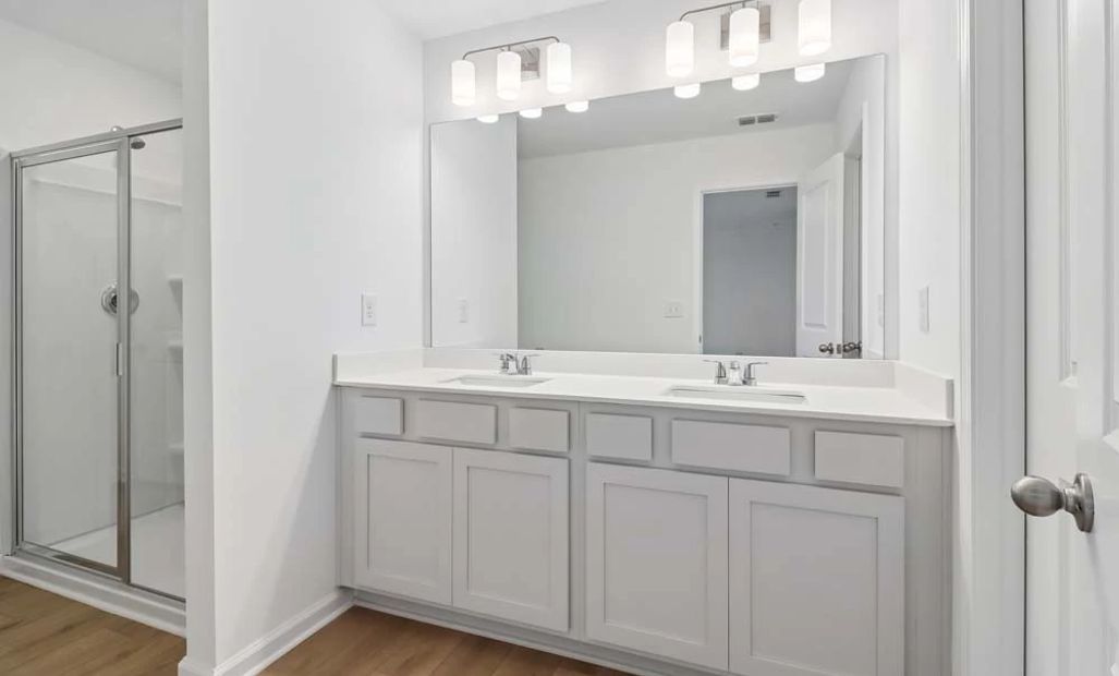 Primary Bathroom Featuring Serene Collection Finishes
