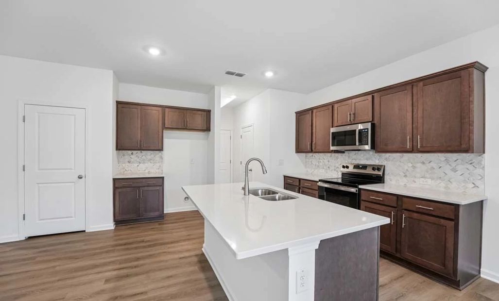 Kitchen Featuring Roosevelt Collection Finishes
