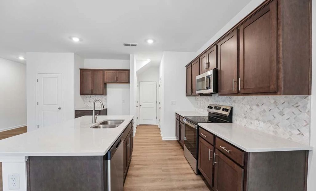 Kitchen Featuring Roosevelt Collection Finishes