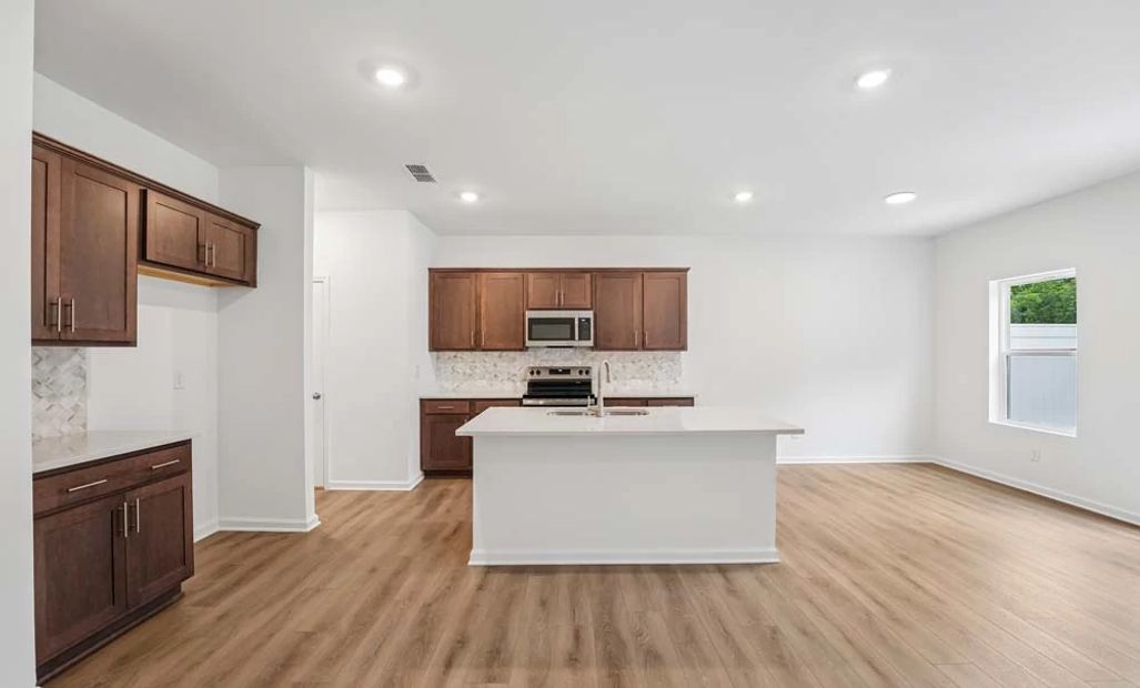 Kitchen Featuring Roosevelt Collection Finishes