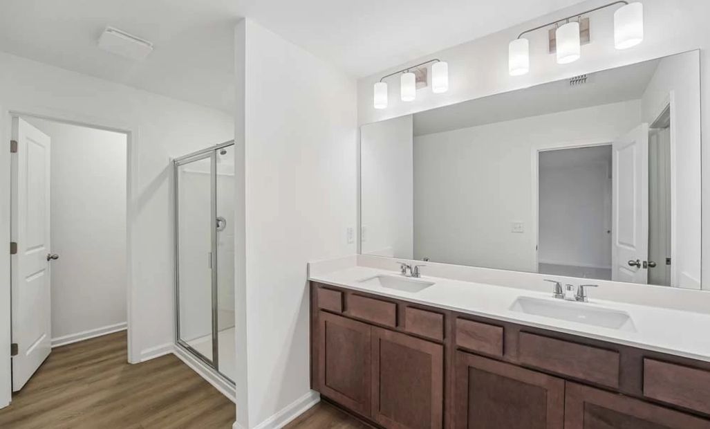 Primary Bathroom Featuring Roosevelt Collection Finishes