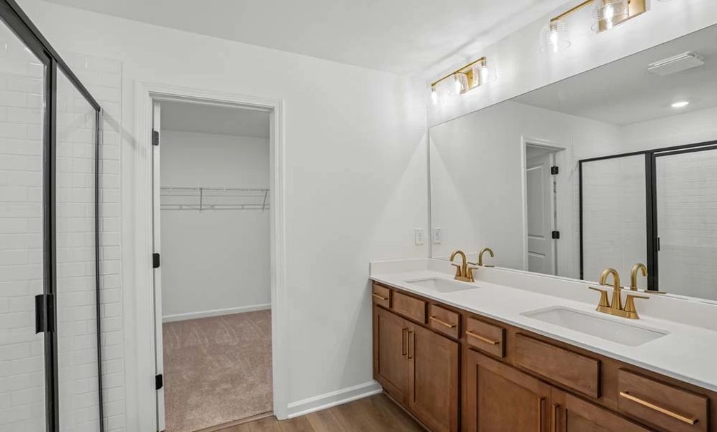 Sample Photo: Primary Bathroom Featuring Laguna Collection Finishes