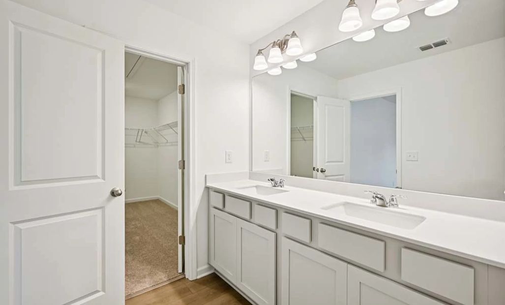 Sample Photo: Primary Bathroom Featuring Milan Collection Finishes