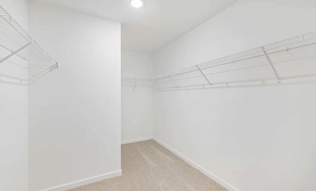 Representative Photo: Primary Bedroom Walk-In Closet