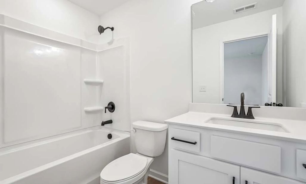 Representative Photo: Bathroom Three featuring Harmony Collection Finishes